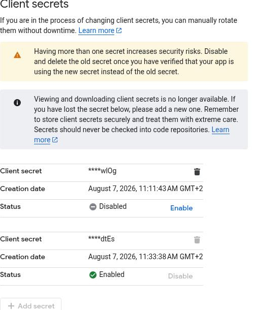 The Client secrets panel showing two masked secrets, one Disabled and one Enabled, above the warning that viewing or downloading a secret is no longer available once its reveal dialog is closed
